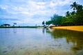 Rusty old fishing boat ship on the quiet yellow sandy beach in the fresh morning sunrise air Royalty Free Stock Photo