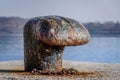 Rusty old iron dock on a pier Royalty Free Stock Photo