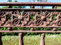 Rusty old iron fence with flower details Royalty Free Stock Photo