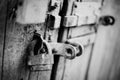 A rusty old lock on a wooden door Royalty Free Stock Photo