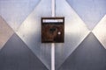 Rusty old mailbox with letter on metallic gate Royalty Free Stock Photo