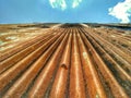 Rusty old metal sheet roof background Royalty Free Stock Photo