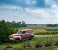 Rusty old panel truck in a farm field Royalty Free Stock Photo