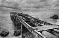 Rusty old pier in a cloudy day Royalty Free Stock Photo