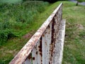 Rusty old railing at lawn