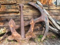 Rusty old ship anchors on the shore Royalty Free Stock Photo