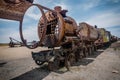 Rusty old steem train at train cemetery in Bolivia Royalty Free Stock Photo