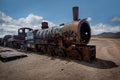 Rusty old steem train at train cemetery in Bolivia Royalty Free Stock Photo