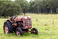 Rusty old tractor in field Royalty Free Stock Photo