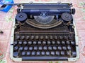 Rusty old typewriter on the floor Royalty Free Stock Photo