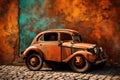 Rusty old vintage car with abstract wall background.