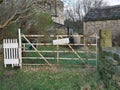 Rusty old white field and side gate