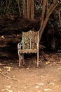 Rusty old white Victorian iron lawn chair