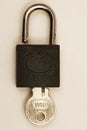 Rusty padlock used to lock the doors of places such as garage doors, warehouses. Rusty padlock. Royalty Free Stock Photo