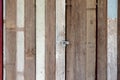 rusty padlock on wooden door old Royalty Free Stock Photo