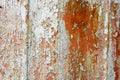 Rusty painted metal texture. Old iron background painted in grey with rust. Weathered metal wall surface with cracked paint Royalty Free Stock Photo