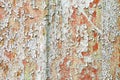 Rusty painted metal texture. Old iron background painted in grey with rust. Weathered metal wall surface with cracked paint Royalty Free Stock Photo