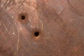 Rusty panel with bullet holes Royalty Free Stock Photo
