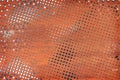 Rusty perforated metal surface