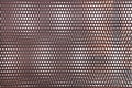 Rusty perforated metal surface Royalty Free Stock Photo