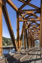 Rusty powerful metal railway bridge across the Columbia River in Columbia Gorge Royalty Free Stock Photo