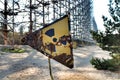 Rusty radioactivity warning sign in the Chernobyl exclusion zone Royalty Free Stock Photo