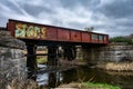 Rusty Railroad Bridge With Graffiti