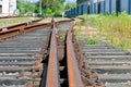 Rusty rails of the abandoned railroad. Royalty Free Stock Photo