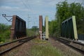 Rusty railway bridge with two tracks Royalty Free Stock Photo