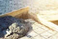 Rusty rebar grids with spatula in a concrete floor