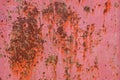 rusty red sun faded paint on flat sheet metal surface full-frame background and texture Royalty Free Stock Photo