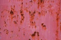 rusty red sun faded paint on flat sheet metal surface full-frame background and texture Royalty Free Stock Photo
