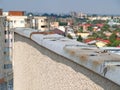 Rusty roof pannel on an apartment block