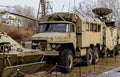 Rusty Russian military vehicle in a museum outdoors