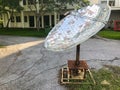 Rusty satellite on the ground at University, Thailand