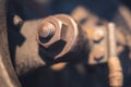 Rusty and nut macro in old rusted engine Royalty Free Stock Photo