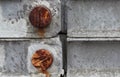 Rusty screws in a steel bridge