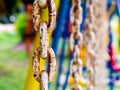 Rusty seamlessly chain isolated on blurred background