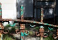 Rusty section of decorative metal fencing