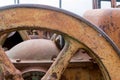 Rusty section of a wheel on an abandoned tractor Royalty Free Stock Photo