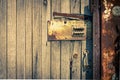 Rusty Security Lock at the Old Wooden Door