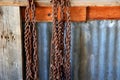 Rusty sheets and metal chains Royalty Free Stock Photo