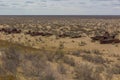 Rusty ships at the ship graveyard in former Aral sea port town Moynaq Mo ynoq or Muynak , Uzbekist Royalty Free Stock Photo