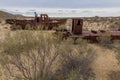 Rusty ships at the ship graveyard in former Aral sea port town Moynaq Mo ynoq or Muynak , Uzbekist Royalty Free Stock Photo