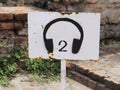 A Rusty Sign of Tourist Audio