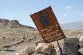 A rusty sign warns the public that the area beyond is a closed military zone, in the ancient Armenian city of Ani, in modern day T