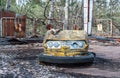 Rusty small children cars in abandoned amusement park in Pripyat, Chernobyl exclusion zone