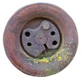 Rusty solid iron   wheel from an retro tractor with yellow  lichen spots  isolated Royalty Free Stock Photo