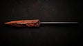 A rusty spear with a black handle. Royalty Free Stock Photo