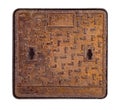 Rusty square manhole cover with a textured surface Royalty Free Stock Photo